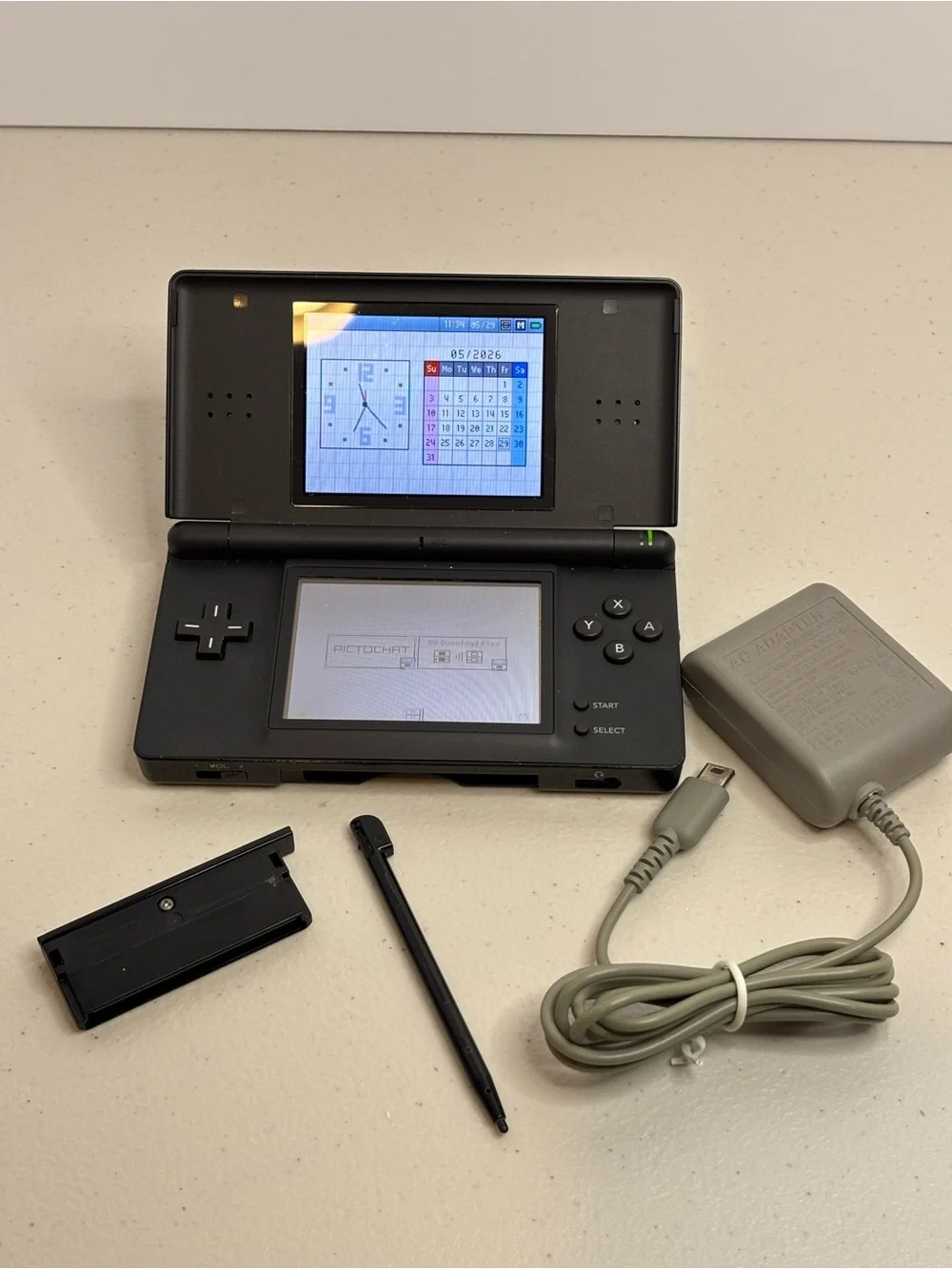 Nintendo DS Lite Bundle - Complete Handheld Console with Charger and Two Games